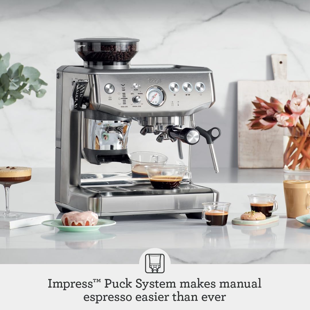 Sage Barista Touch Impress espresso machine in brushed stainless steel on a marble kitchen counter w