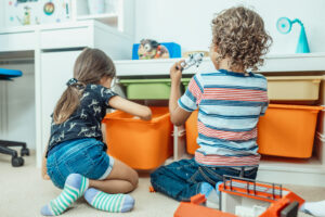 Keeping a playroom organized while maintaining a clean, "tropical fusion" aesthetic is all about blending natural textures with smart, modular storage. Since you're balancing a home office and a creative space for Nicola, the goal is to make "tidy-up time" a seamless part of your day rather than a chore.